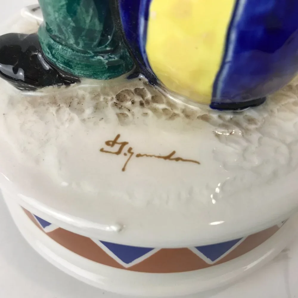 Hand painted ceramic clown music box signed by the artist